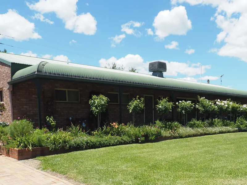 lovingly Maintained Spacious Home on Acreage