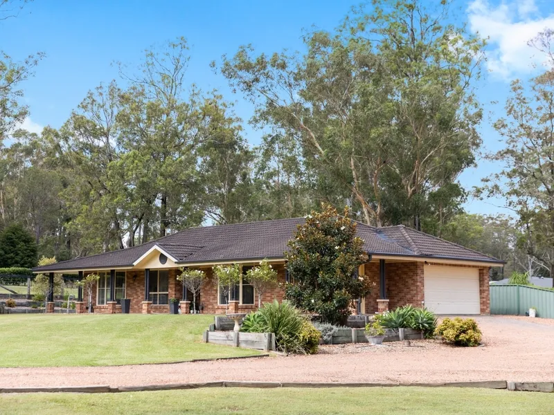 Luxurious 6-Bedroom Family Home on 2.5 Acres with Pool and Shed!