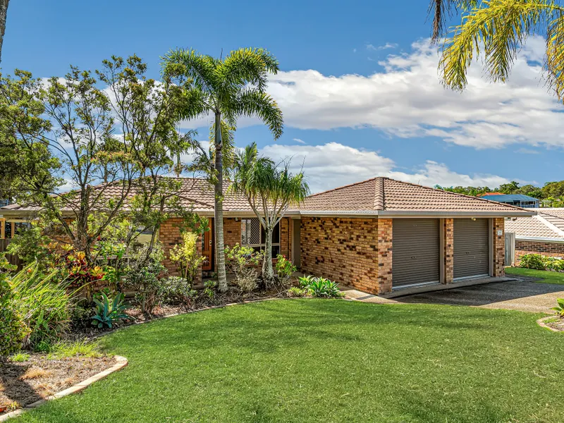 This low set brick home offers enough space for the entire family.