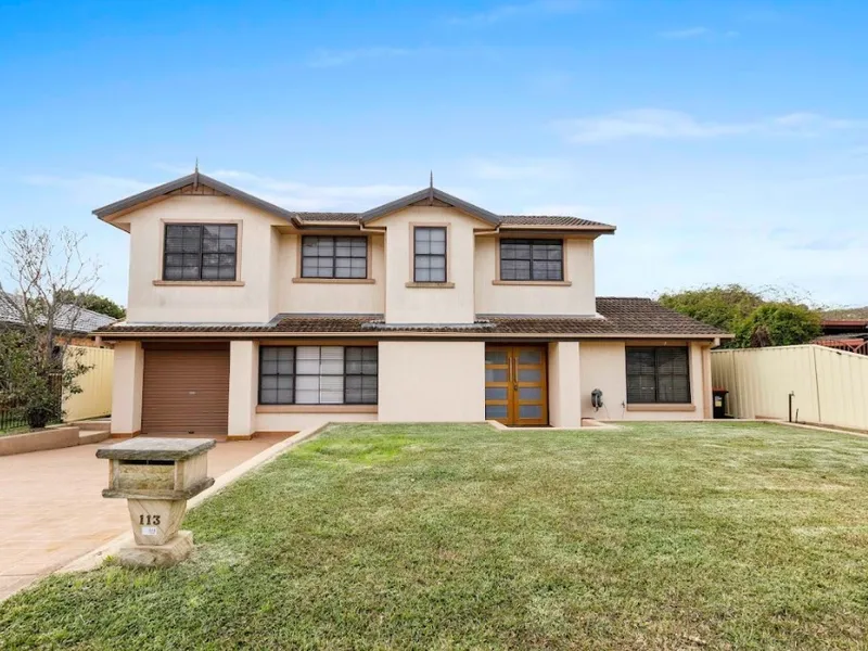FRESHLY PAINTED FIVE BEDROOM HOME