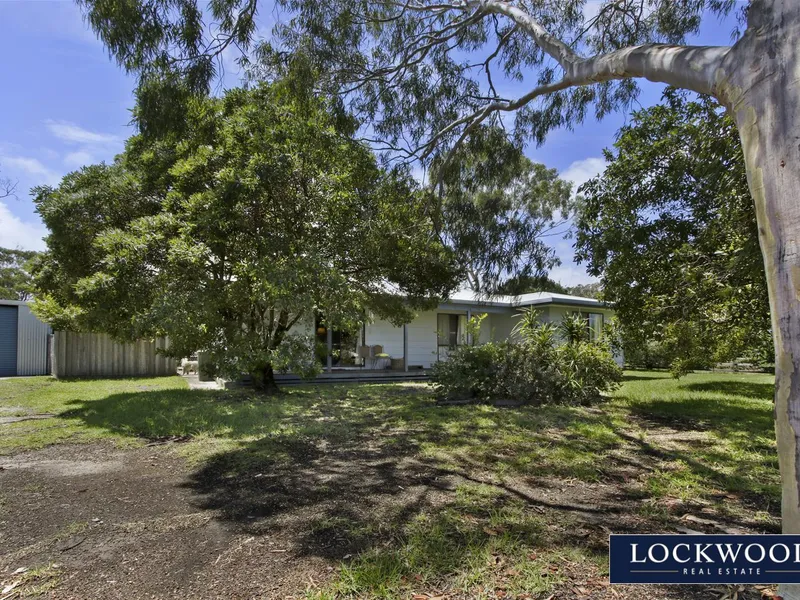 FAMILY HOME ON HUGE BLOCK WITH LARGE SHEDDING 