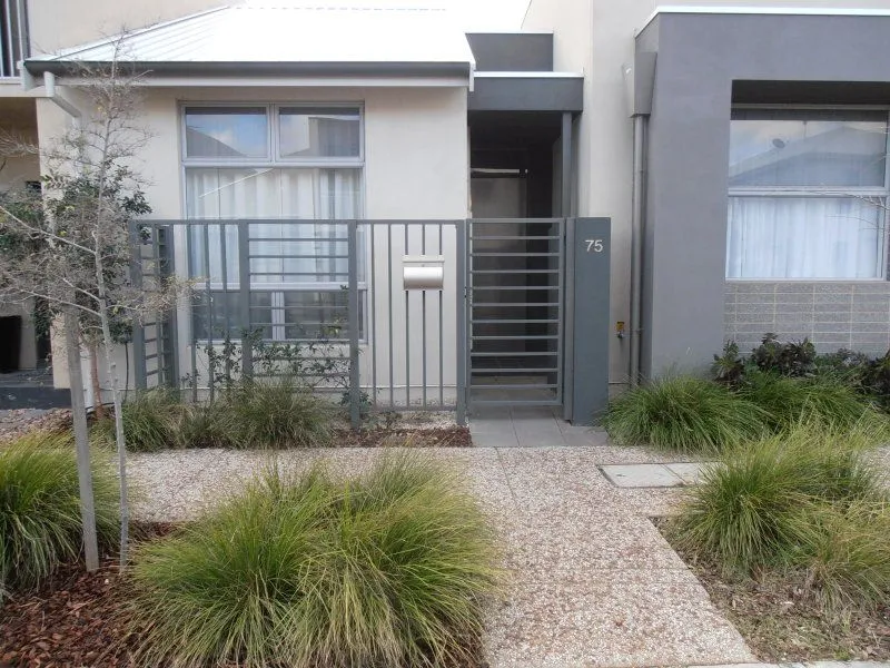 Modern 2 bedroom townhouse with solar panels and split system heating and cooling