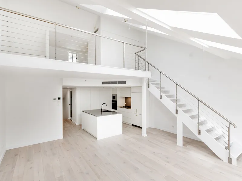 Fully renovated stylish two bedroom loft style apartment with city views