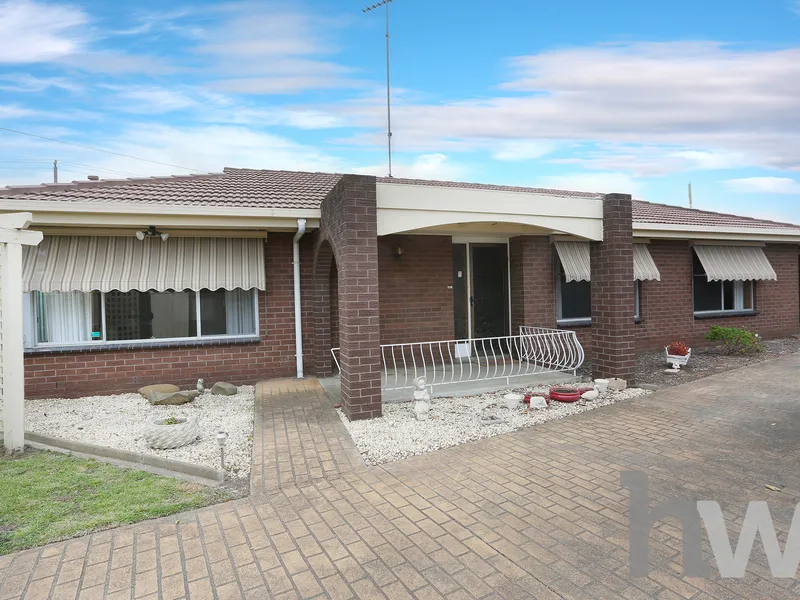 Beautiful home presenting opportunity on a large block