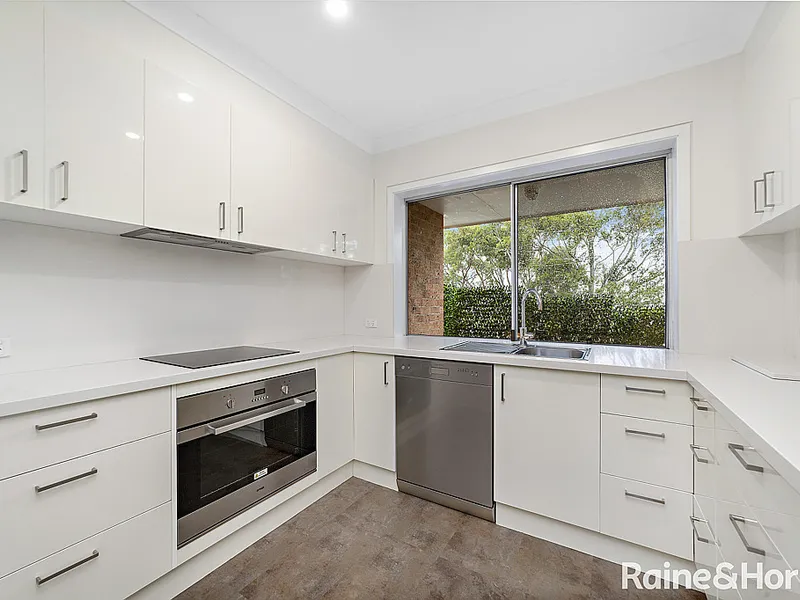 Immaculate Top Floor Apartment within Tranquil Surrounds 