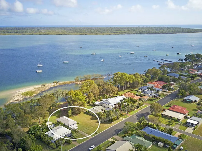 WATERFRONT! SPACIOUS FIVE BEDROOM HOME WITH BREATHTAKING VIEWS! COME LIVE THE DREAM!