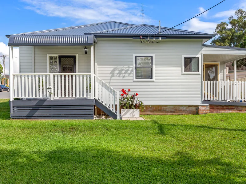 Low Maintenance Corner Lot, Superb Investment Opportunity