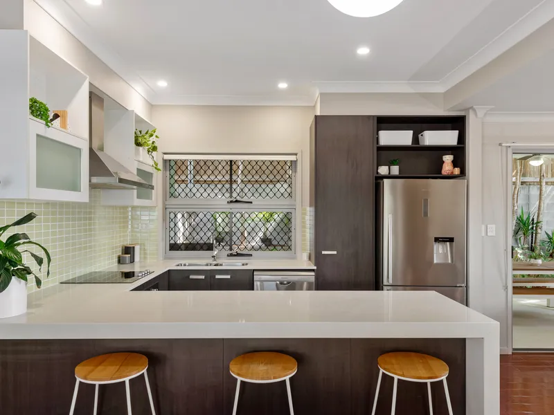 Quiet rear freehold townhome with a superb landscaped courtyard - No Body Corporate!