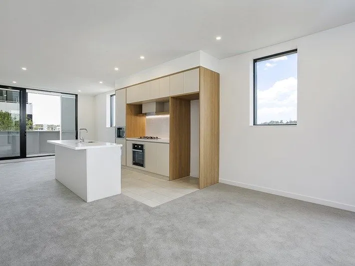 Near new 2 bedroom apartment, steps to the train