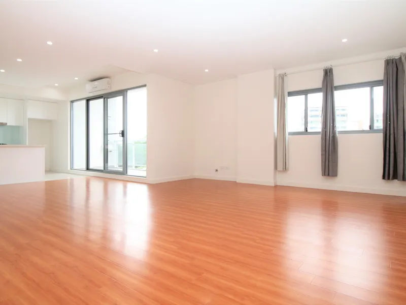 Spacious Modern Three Bedroom Split Level Apartment in Super Convenient Location.