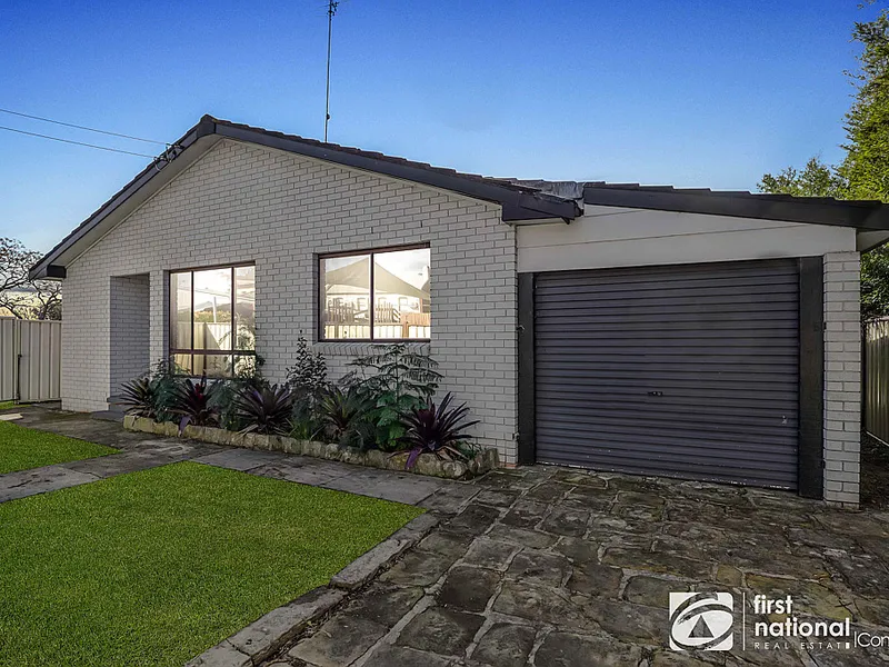 DUAL ROAD ACCESS WITH A LARGE SHED!