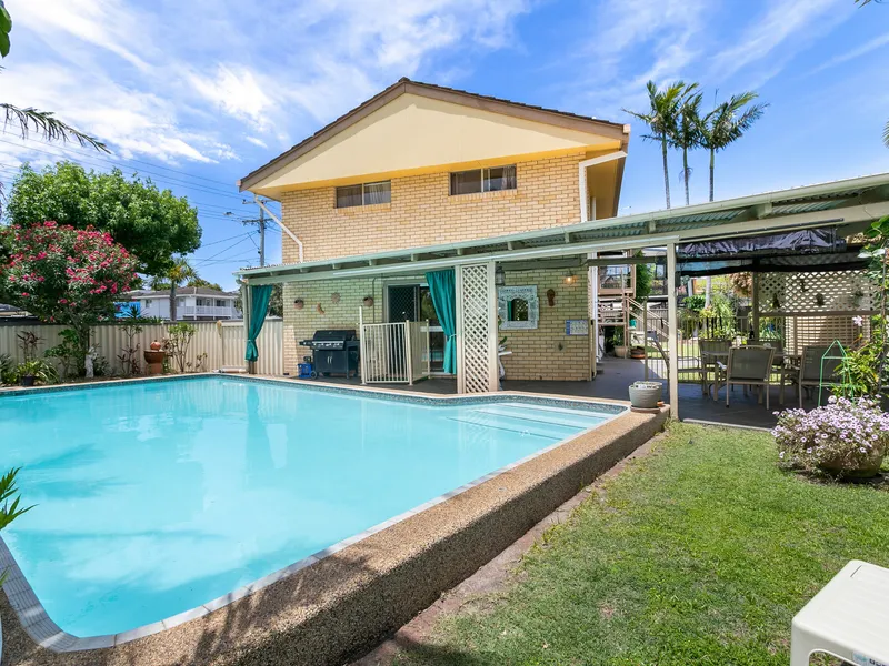 PRICED SLASHED!  POOL! DUAL LIVING POTENTIAL!