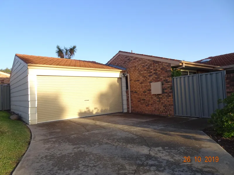 Three bedroom single level townhouse