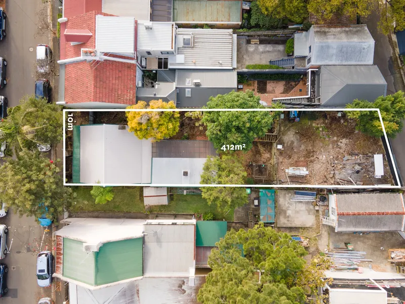 Classic cottage on 412sqm block with future potential