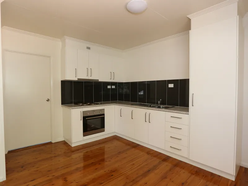 Ground Level Modern Unit - Great Location!