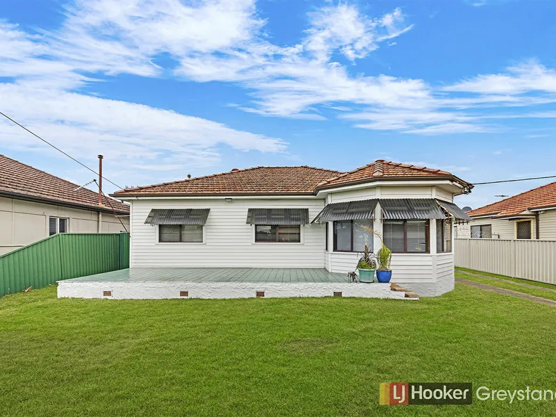 CONVENIETLY LOCATED ACROSS FROM SHOPS