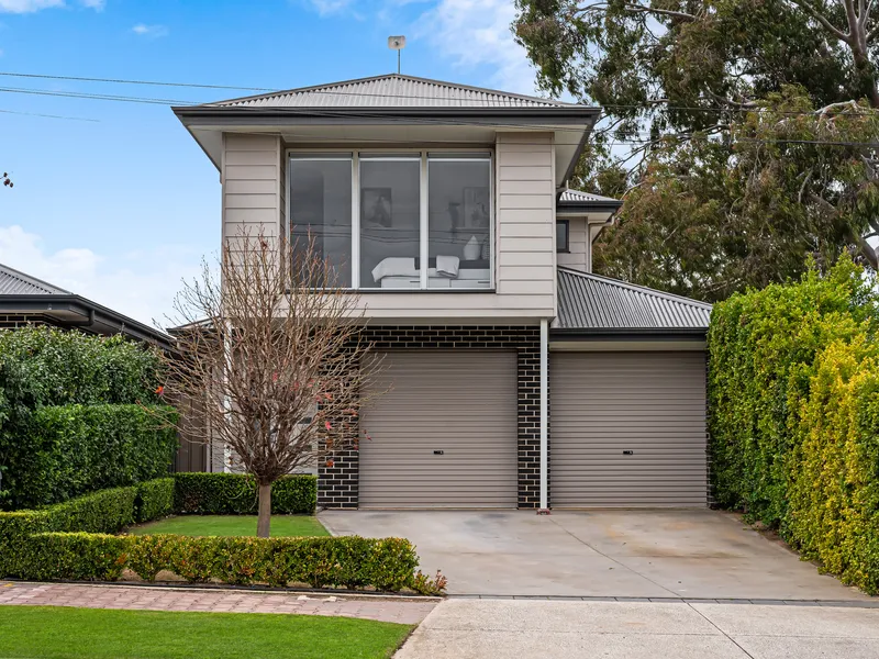 Light-Spilling Suburban Escape: Modern Feature, Stylishly Finished