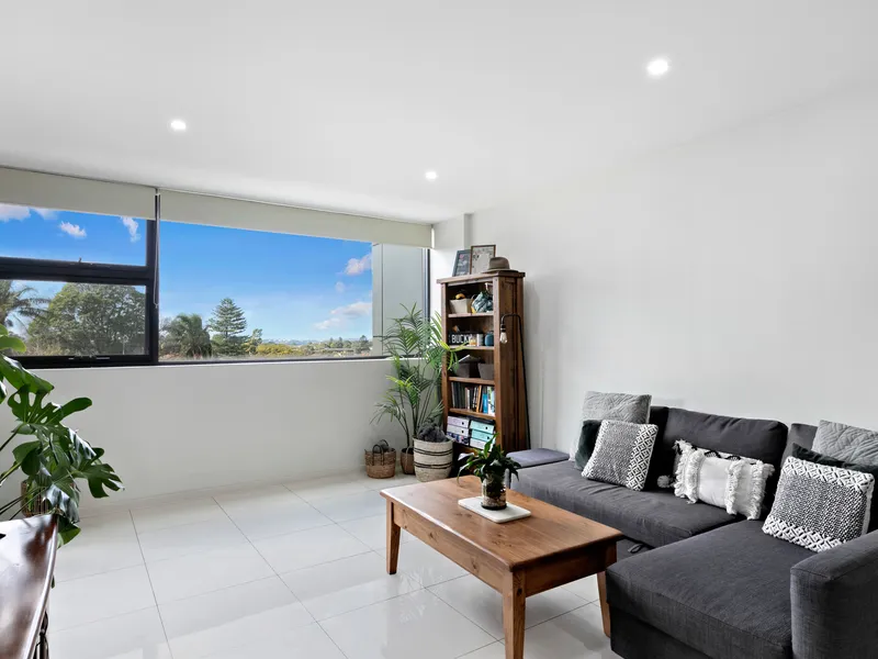 SUN-FILLED 2 BEDROOM APARTMENT WITH 2 SECURITY CAR SPACES