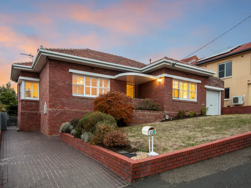 Sympathetically Renovated 1950 Brick Residence in Prime Location