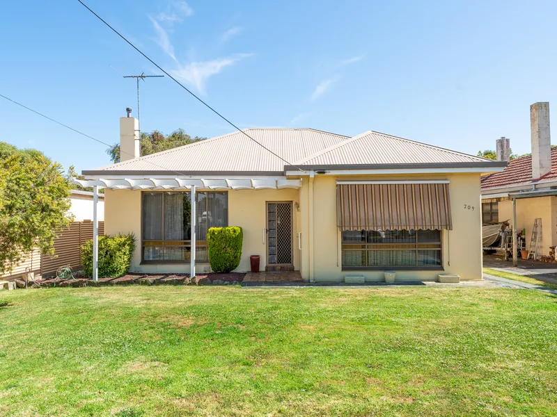 Beautifully Maintained Vintage Home in a Highly Central Location