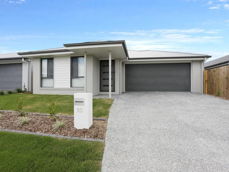 NEWLY BUILT, FOUR BEDROOM HOME