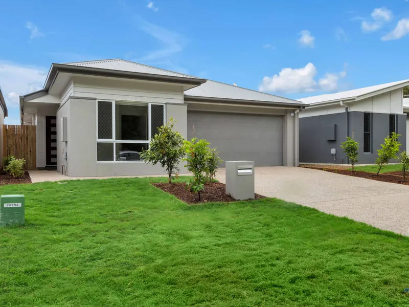 Modern home with huge back yard.