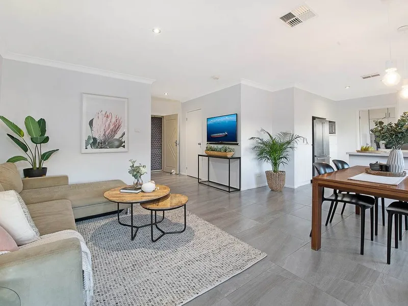 A feature filled home in Caddies Creek School Catchment.