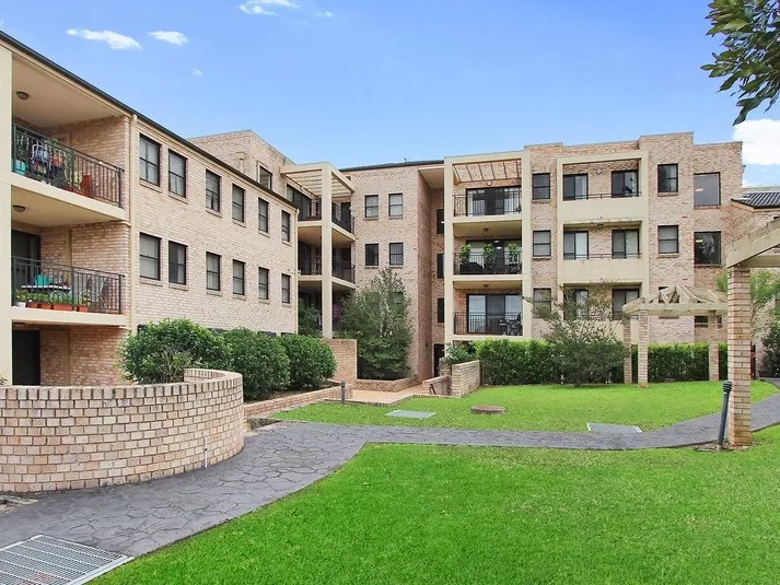 GROUND FLOOR UNIT IN SECURE COMPLEX WITH PRIVATE COURTYARD AND ADDITIONAL STUDY AREA!