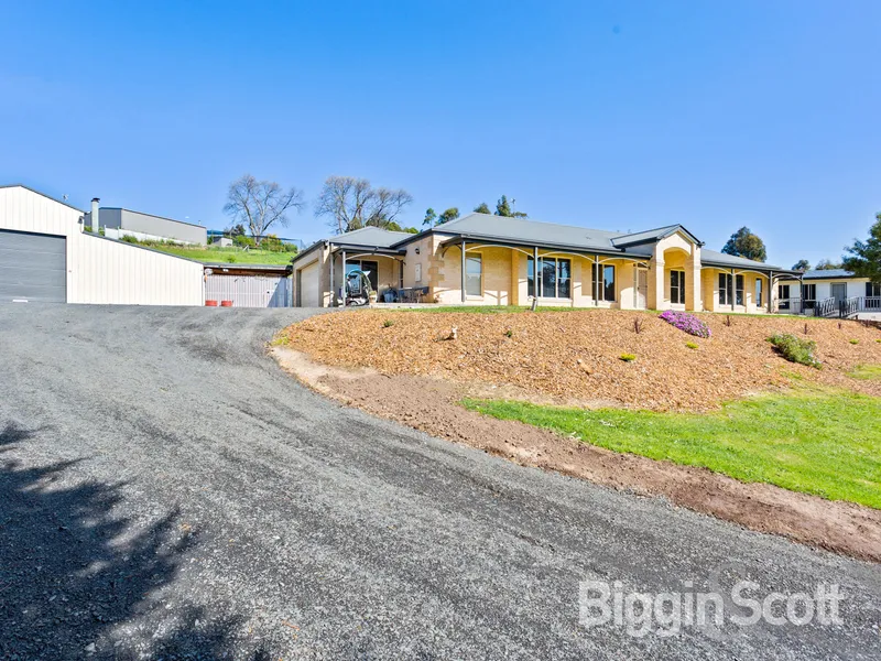 MODERN FAMILY HOMESTEAD WITH BONUS COTTAGE ON 1 & 1/4 ACRES