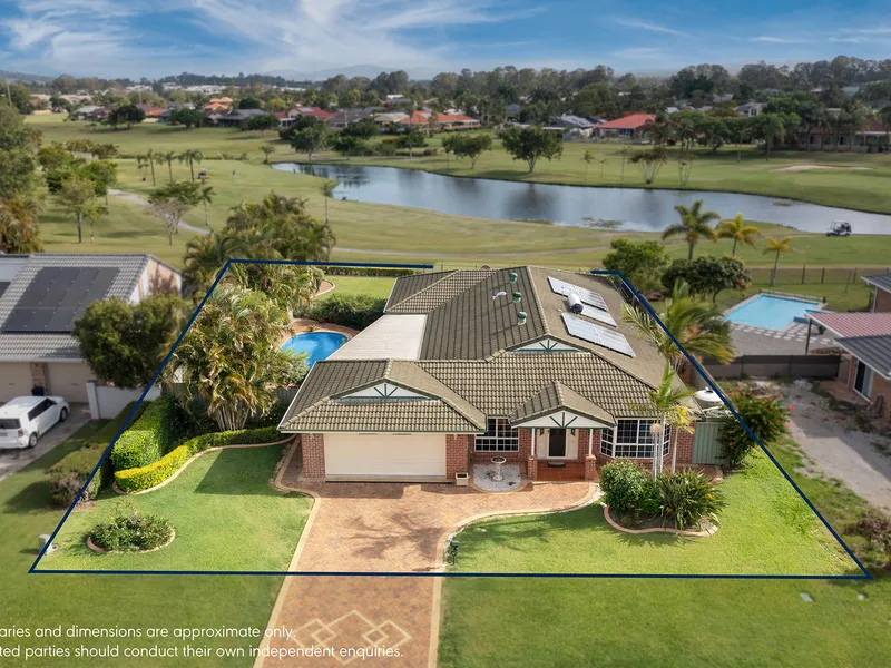 MASSIVE FAMILY HOME OVERLOOKING THE GOLF COURSE! YOU WILL LOVE LIVING IN 
