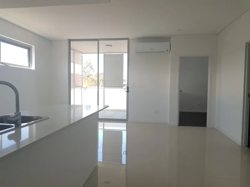 Modern, Sleek & Near New!!