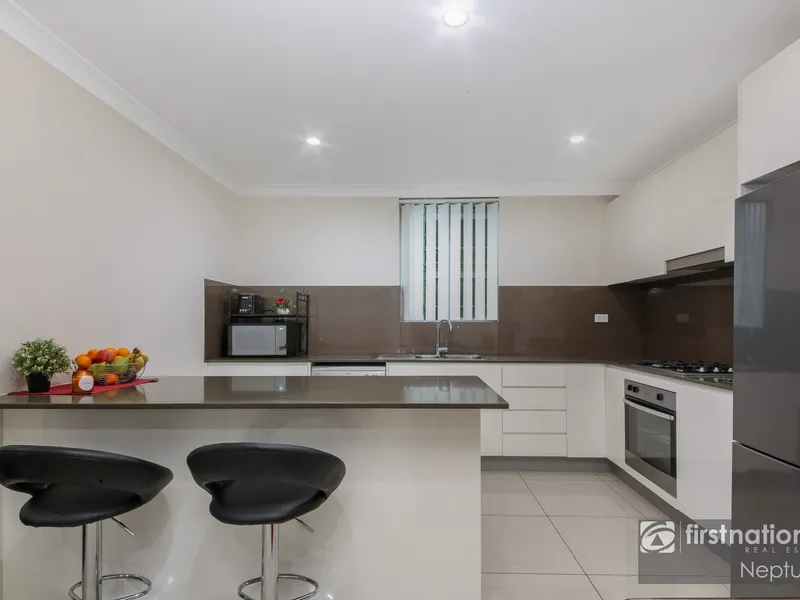 Double Brick Modern Apartment with Massive Kitchen!