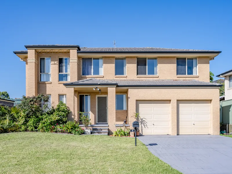 Impressive home with established yard and views