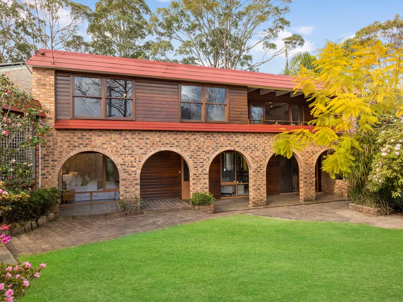 Family oasis on near level lawn adjoining reserve