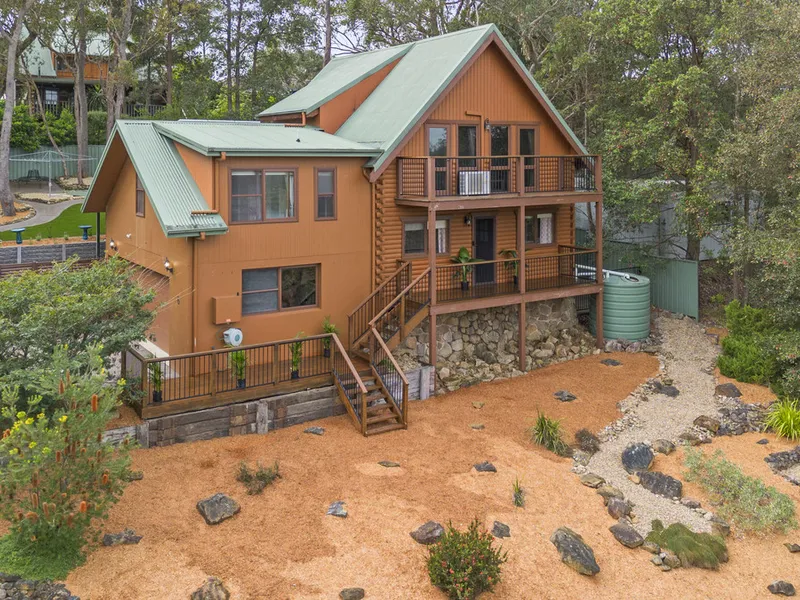 Stunning Pioneer Log Home with In-Demand Separate Living Quarters!