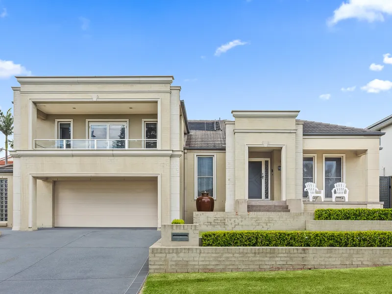 Exquisite Three-Level Haven in Shell Cove