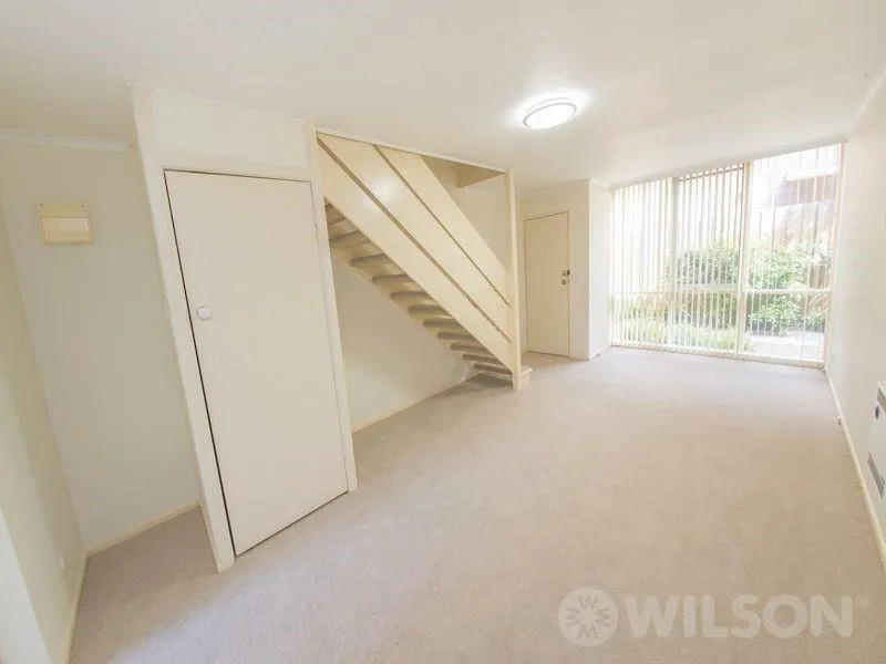 Light filled two bedroom townhouse with TWO parking spaces