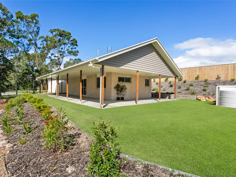 Brand new 1 bedroom home with large garage space