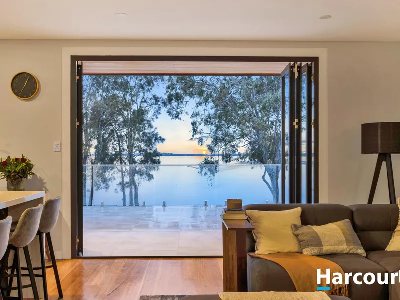 Awe-Inspiring Absolute Waterfront Home on Huge Block