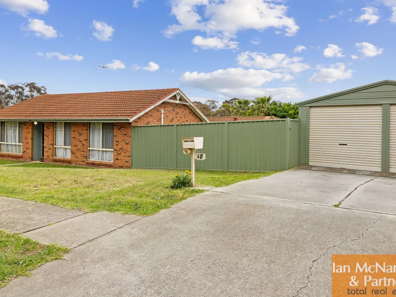 Solid Family Home with Massive Backyard !