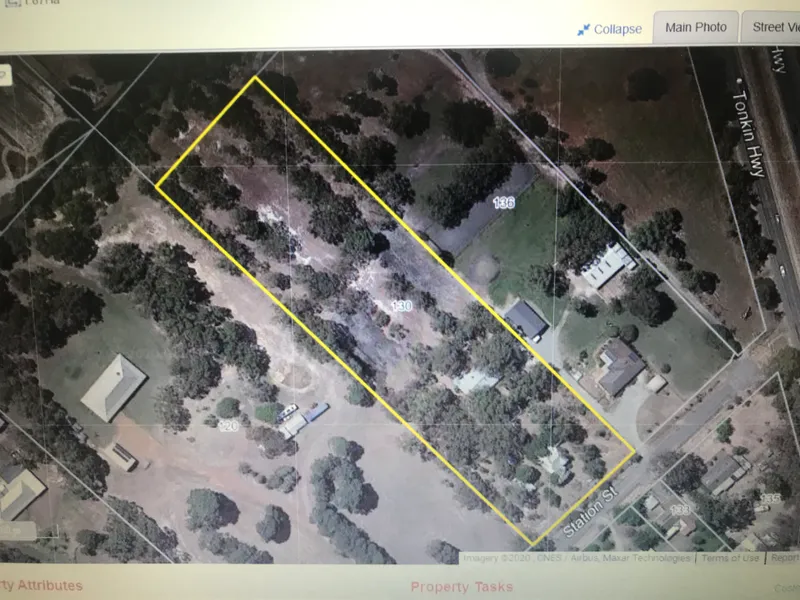 4.5 acres. Zoned rural. Land plus outbuildings.