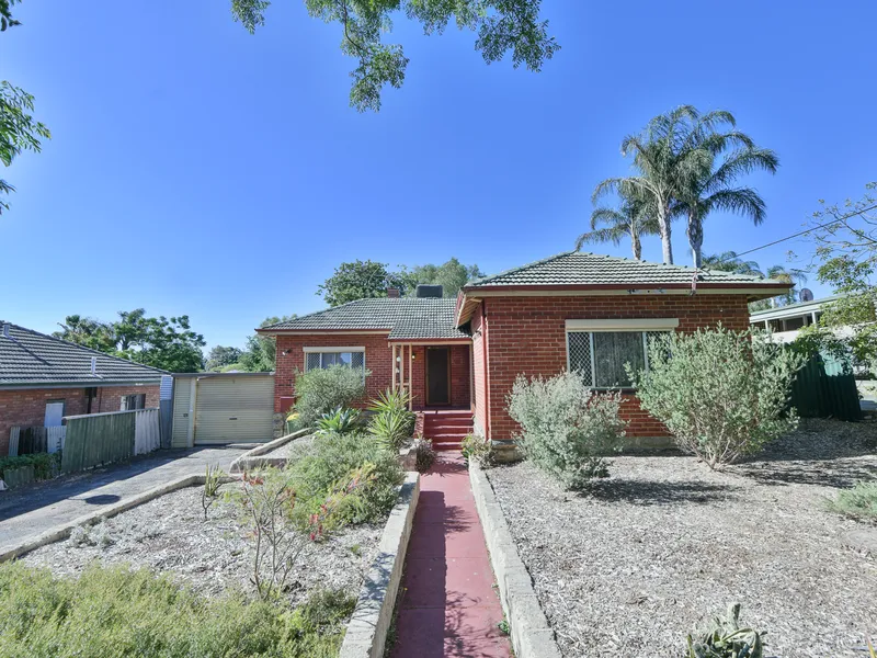This is a must see property with a HUGH workshop