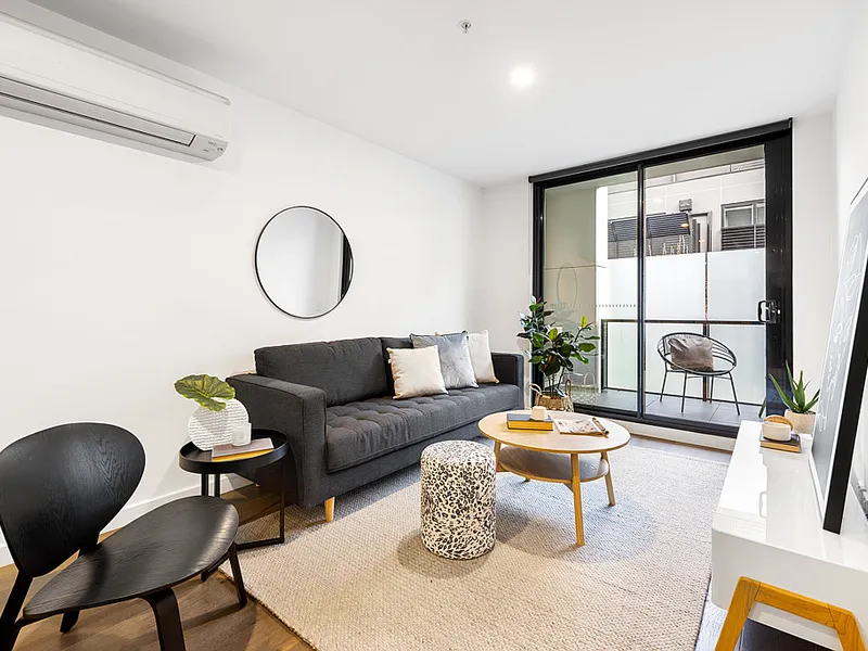 POLISHED APARTMENT IN UPSCALE COMPLEX