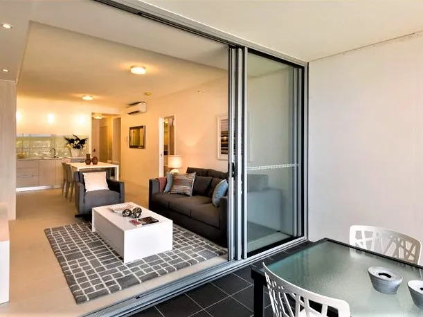 Large Balcony Leading from Bedroom and Living