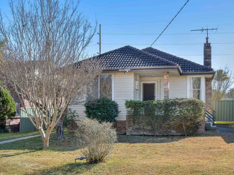 Three bedroom home with option of fourth bedroom and separate entry