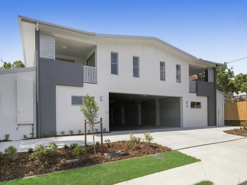 Near New Lower-Level Unit with Courtyard