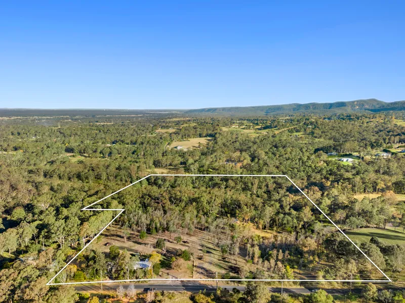25 acres with two residences!
