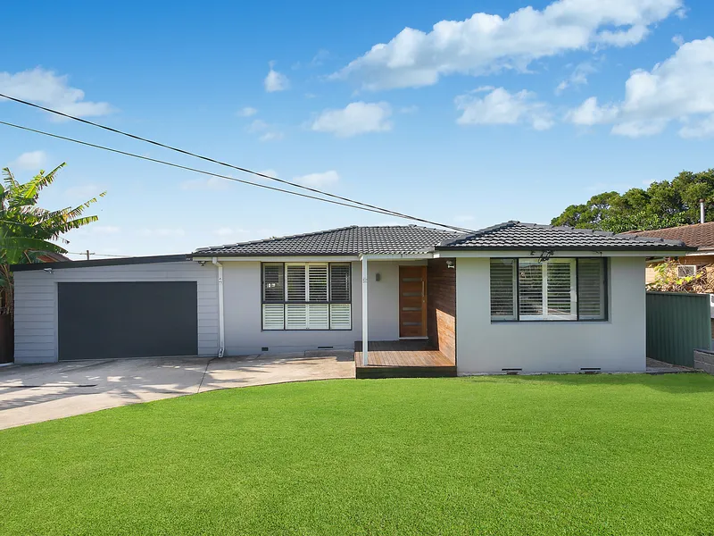Rendered brick home in superb neighborhood