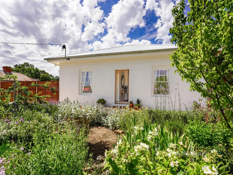 Elegantly updated original 1870s cottage