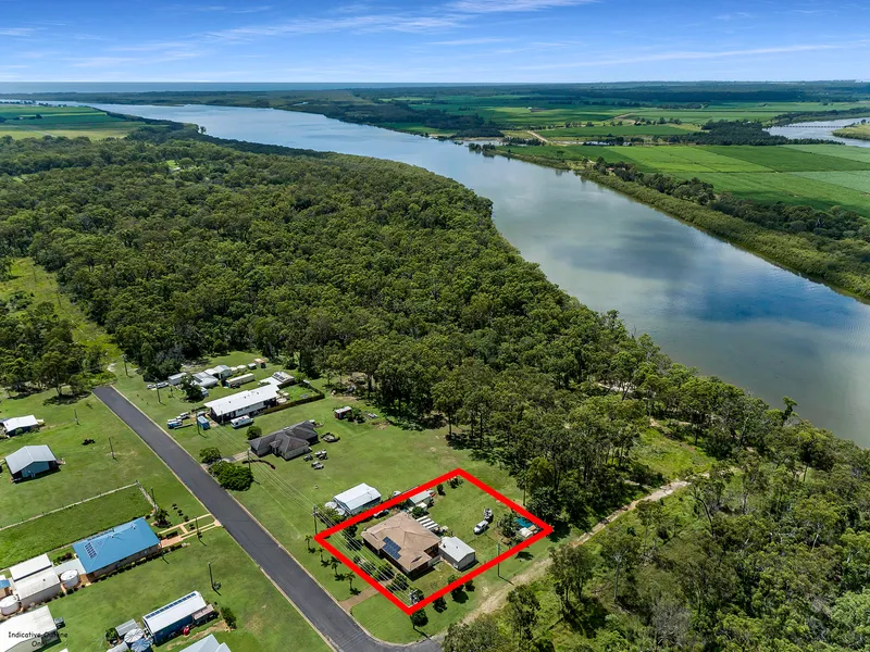 Quality brick home Overlooking the Kolan River with two titles!